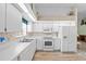 Bright kitchen with white cabinets and modern appliances at 3341 Highland Fairways Blvd, Lakeland, FL 33810