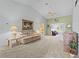 Bright and spacious living room featuring high ceilings, comfortable seating, and neutral carpeting at 3341 Highland Fairways Blvd, Lakeland, FL 33810