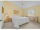Calm main bedroom features a ceiling fan, plush carpet and a window at 3341 Highland Fairways Blvd, Lakeland, FL 33810