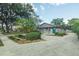 Charming single-story home with well-maintained landscaping and a blue front door at 4008 S Carlisle Rd, Lakeland, FL 33813