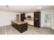 Spacious kitchen with a large island, modern appliances, and ample cabinet space at 4008 S Carlisle Rd, Lakeland, FL 33813