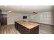 Spacious open concept kitchen with large island and granite countertops at 4008 S Carlisle Rd, Lakeland, FL 33813
