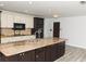 Bright kitchen features granite countertops, an island, and ample cabinet space at 4008 S Carlisle Rd, Lakeland, FL 33813