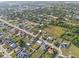 Community aerial view displaying the house within a residential neighborhood with easy access to green spaces at 4041 Byrds Crossing Dr, Lakeland, FL 33812