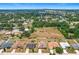 A panoramic aerial view of a tranquil residential neighborhood nestled among mature trees and sprawling green spaces at 4041 Byrds Crossing Dr, Lakeland, FL 33812