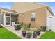 Cozy outdoor patio with comfortable seating, a fire pit, and a serene garden view at 4041 Byrds Crossing Dr, Lakeland, FL 33812