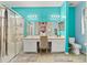 Bright, spacious bathroom featuring double vanity, walk-in shower, and a separate toilet at 4041 Byrds Crossing Dr, Lakeland, FL 33812
