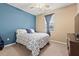 This bedroom offers a ceiling fan and one window with a curtain at 4041 Byrds Crossing Dr, Lakeland, FL 33812