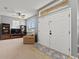 Inviting foyer with double doors, a ceiling fan, and a view into the living space at 4041 Byrds Crossing Dr, Lakeland, FL 33812