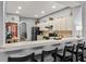 Cozy kitchen featuring breakfast bar and stainless steel appliances at 4041 Byrds Crossing Dr, Lakeland, FL 33812