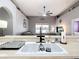 Farmhouse style kitchen sink looking out to the living area at 4041 Byrds Crossing Dr, Lakeland, FL 33812