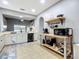 Spacious kitchen with ample counter space, island and stainless steel dishwasher at 4041 Byrds Crossing Dr, Lakeland, FL 33812