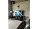 Comfortable living room area with a TV, decorative plant, and a black media console at 4041 Byrds Crossing Dr, Lakeland, FL 33812