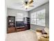 This cozy living room features neutral walls, a ceiling fan, and natural light from the bright windows at 4041 Byrds Crossing Dr, Lakeland, FL 33812