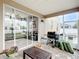Covered patio with outdoor kitchen, grill, and sliding glass doors at 4041 Byrds Crossing Dr, Lakeland, FL 33812