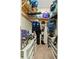 This walk-in closet offers shelves, clothes rods and storage for your personal belongings at 4041 Byrds Crossing Dr, Lakeland, FL 33812