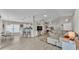 Open floor plan with a view of the living room, kitchen, and dining area at 412 Emerald Cove Loop, Lakeland, FL 33813