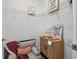 This closet features wire shelving, a small sitting chair, and charming decor for a cozy, organized space at 4122 Conjunction Way, Apopka, FL 32712