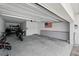 Spacious garage with ample storage, suitable for multiple vehicles and featuring an American flag accent at 4122 Conjunction Way, Apopka, FL 32712