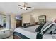The main bedroom has a ceiling fan and a television at 432 Sandestin Dr, Winter Haven, FL 33884