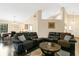 Cozy living room with high ceilings, modern sofas, and a dining area at 432 Sandestin Dr, Winter Haven, FL 33884