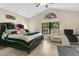 Bright main bedroom with a large window, vaulted ceiling, and a king-size bed at 432 Sandestin Dr, Winter Haven, FL 33884