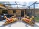 Inviting patio with outdoor seating arrangements and a fire pit perfect for social gatherings at 4825 Luce Rd, Lakeland, FL 33813