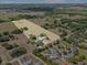 A large aerial outline displays property boundaries, emphasizing expansive land with scattered trees at 511 Hickory Hammock Rd, Lake Wales, FL 33859