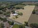 Aerial outline highlights the property's boundaries, showcasing a home and vast land at 511 Hickory Hammock Rd, Lake Wales, FL 33859