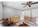 Bedroom featuring crib and double closets at 511 Hickory Hammock Rd, Lake Wales, FL 33859