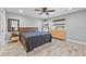 Bedroom featuring wood floors, dresser, and natural light at 511 Hickory Hammock Rd, Lake Wales, FL 33859