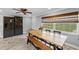 Bright dining area features a large table with seating and natural light at 511 Hickory Hammock Rd, Lake Wales, FL 33859