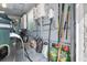 Garage featuring an EV charger, storage bags, and assorted equipment at 511 Hickory Hammock Rd, Lake Wales, FL 33859