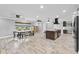 Open concept boasts dining space, kitchen, and a large living area at 511 Hickory Hammock Rd, Lake Wales, FL 33859