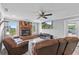 Inviting living room with brick fireplace and comfortable seating at 511 Hickory Hammock Rd, Lake Wales, FL 33859