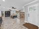 Inviting living space with neutral tones, updated light fixtures, and ample natural light at 511 Hickory Hammock Rd, Lake Wales, FL 33859