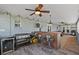 Outdoor patio area featuring a built-in bar, grill, and ceiling fans at 511 Hickory Hammock Rd, Lake Wales, FL 33859