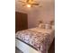 Comfortable bedroom with ample natural light and a decorative closet at 5619 Antler Trl, Lakeland, FL 33811