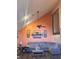 Open living room with high ceilings, a ceiling fan, and a comfortable seating area at 5619 Antler Trl, Lakeland, FL 33811