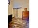 Bright office space with a sliding barn door and wood-look flooring at 5619 Antler Trl, Lakeland, FL 33811