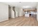 Spacious open-concept living space with kitchen island and stainless steel appliances at 5776 Freshwater Canyon Dr, St Cloud, FL 34771