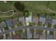 Aerial view of the property surrounded by well-kept lawns and lush landscaping in a golf course community at 6086 Swallow Dr, Lakeland, FL 33809