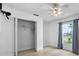 Bedroom featuring closet space, light wood flooring, and a ceiling fan at 6086 Swallow Dr, Lakeland, FL 33809