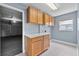 Functional laundry area with storage cabinets and space for appliances at 6086 Swallow Dr, Lakeland, FL 33809