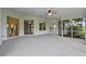 Covered patio featuring ceiling fan, offering a relaxing outdoor space at 6086 Swallow Dr, Lakeland, FL 33809