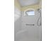 Walk-in shower with accessible grab bars and shower head at 6086 Swallow Dr, Lakeland, FL 33809