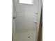 Modern bathroom shower with sleek subway tile and convenient corner shelves at 625 W 9Th St, Lakeland, FL 33805