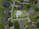 Bird's eye view of this property with fenced yard, pool and lanai in a well-kept residential neighborhood at 647 Hart Lake Dr, Winter Haven, FL 33884