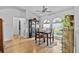 Dining room featuring hardwood floors and plenty of natural light at 647 Hart Lake Dr, Winter Haven, FL 33884