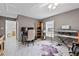 Versatile room with an office area featuring music equipment and comfortable workspace setup at 647 Hart Lake Dr, Winter Haven, FL 33884